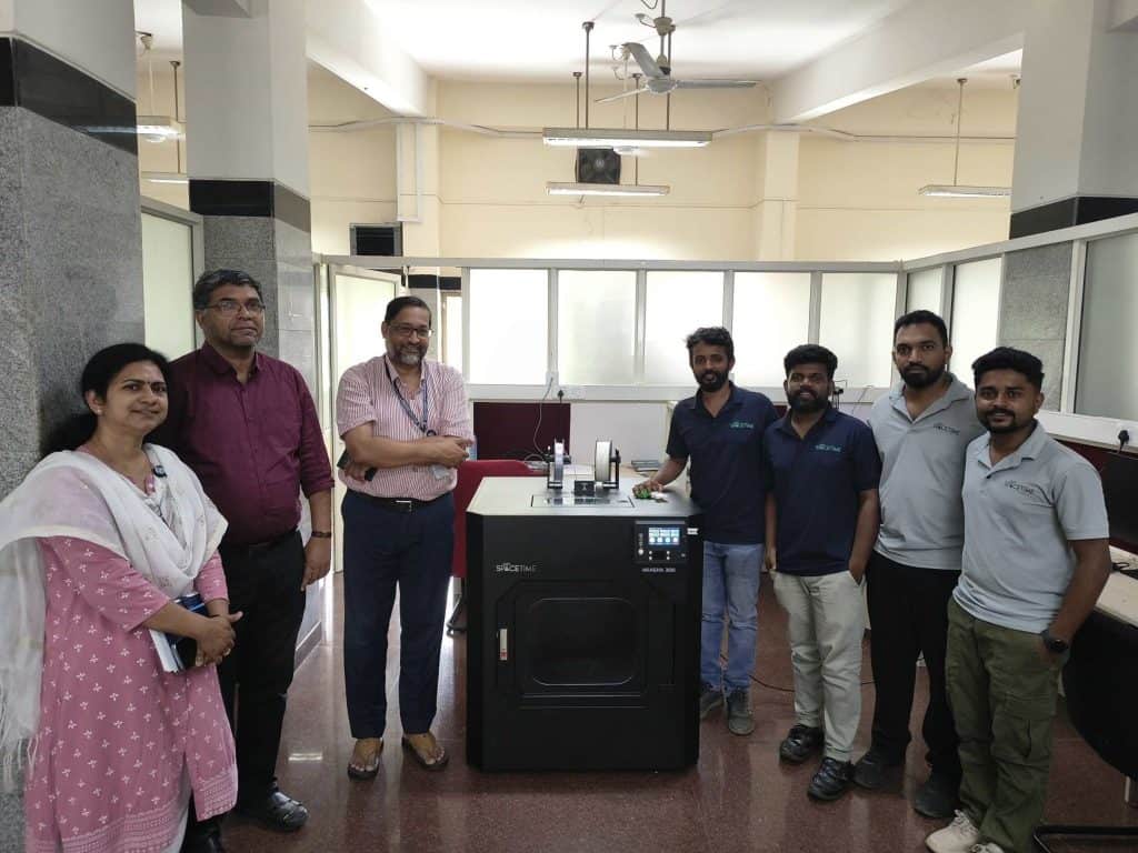 ISRO LPSC officials and the Spacetime 4D team with the Akasha300 3D printer at the Liquid Propulsion Systems Centre in Valiyamala