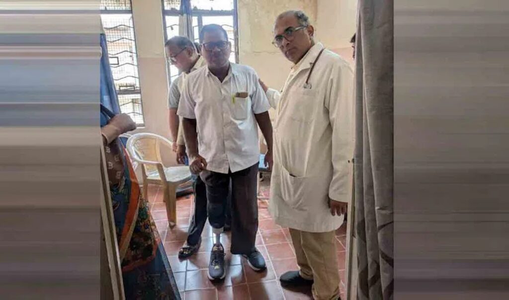 A patient walks on a newly fitted prosthetic at the 3D Printed Limbs facility at Osmania General Hospital in Hyderabad