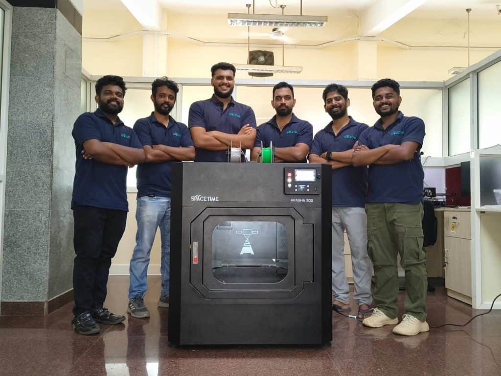 The Spacetime 4D team with the Akasha300 3D printer following its installation at ISRO's Liquid Propulsion Systems Centre