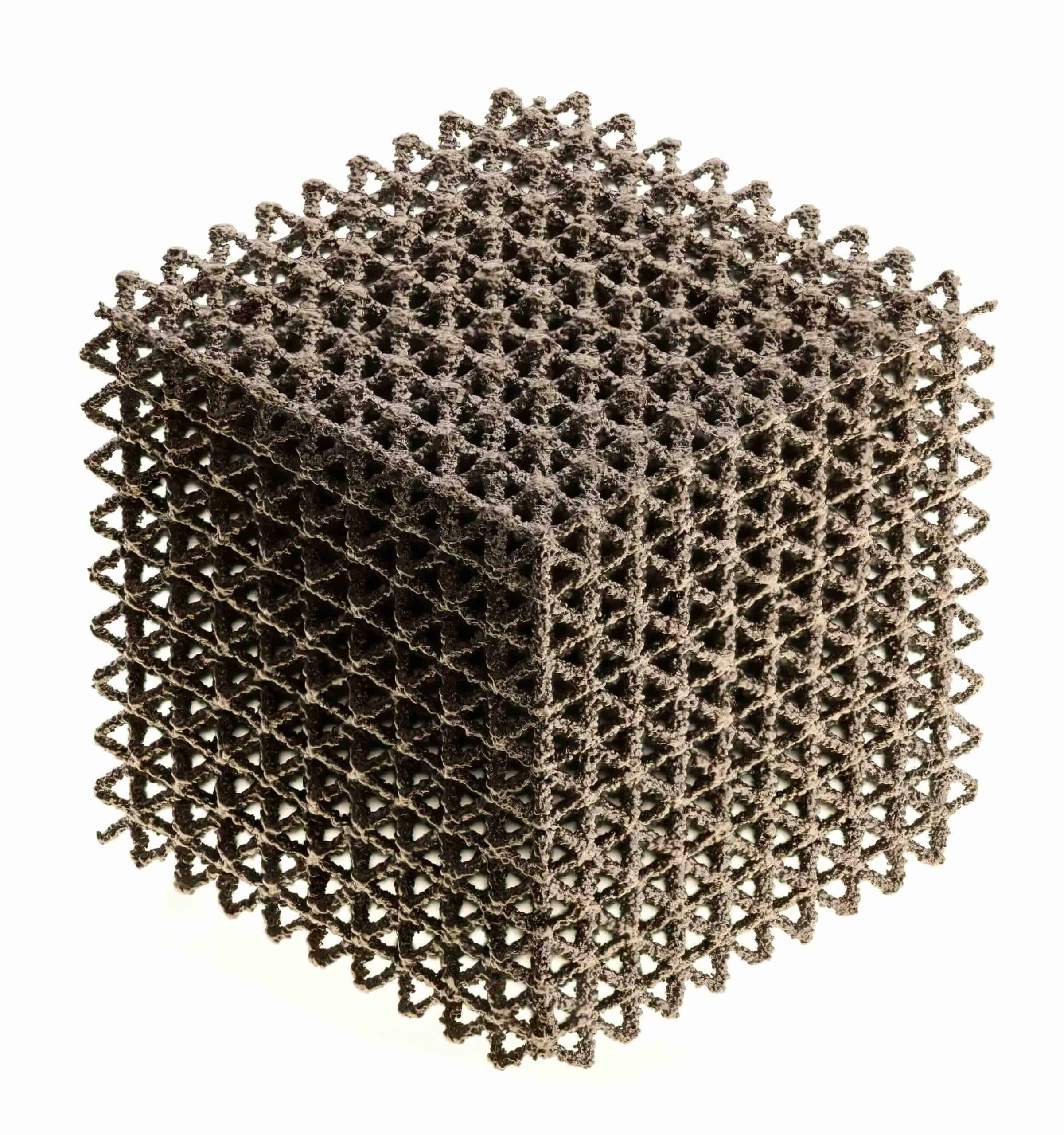 A Ti-6Al-4V (Ti64) lattice cube structure produced using Freemelt E-PBF technology, demonstrating complex geometry capabilities in high-temperature alloys