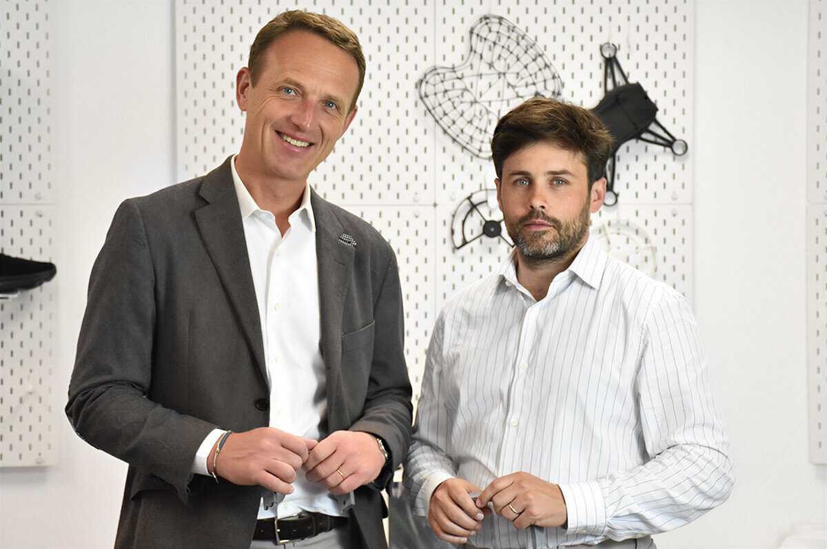 Quentin Kiener and Alexandre d'Orsetti standing in production facility after 3D Prod Acquires Sculpteo to create Europe's leading industrial additive manufacturing service provider